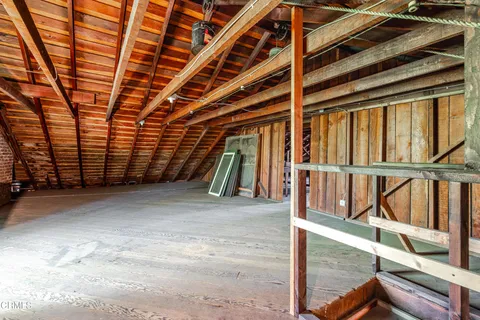 a bathroom with a bathtub and a window
