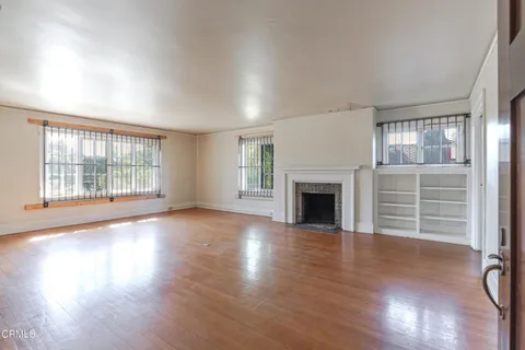 a view of cabinets and window