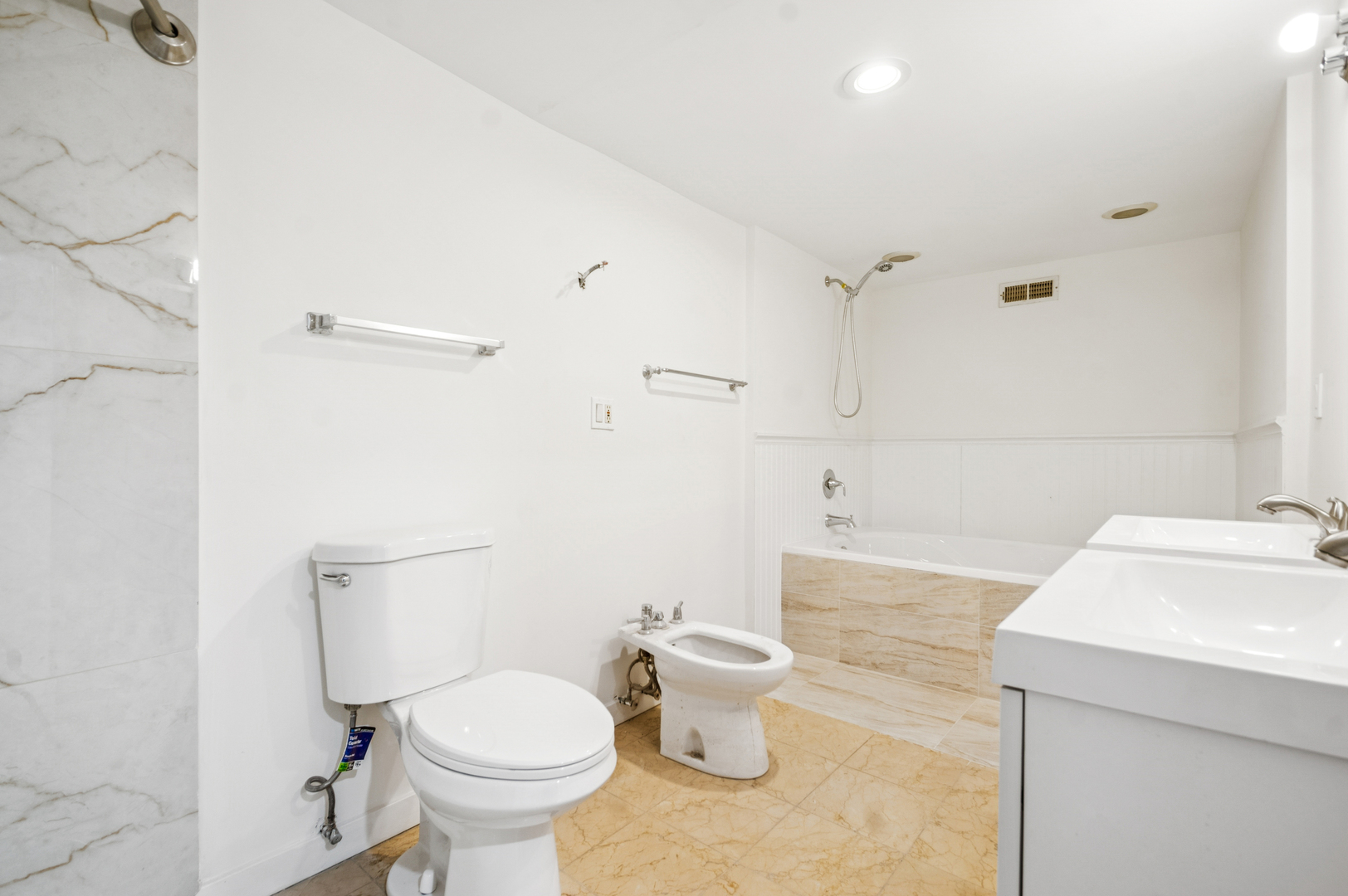 2336 West Taylor Street Chicago, IL 60612 - Photo 13 of 29 a bathroom with a sink toilet and a mirror