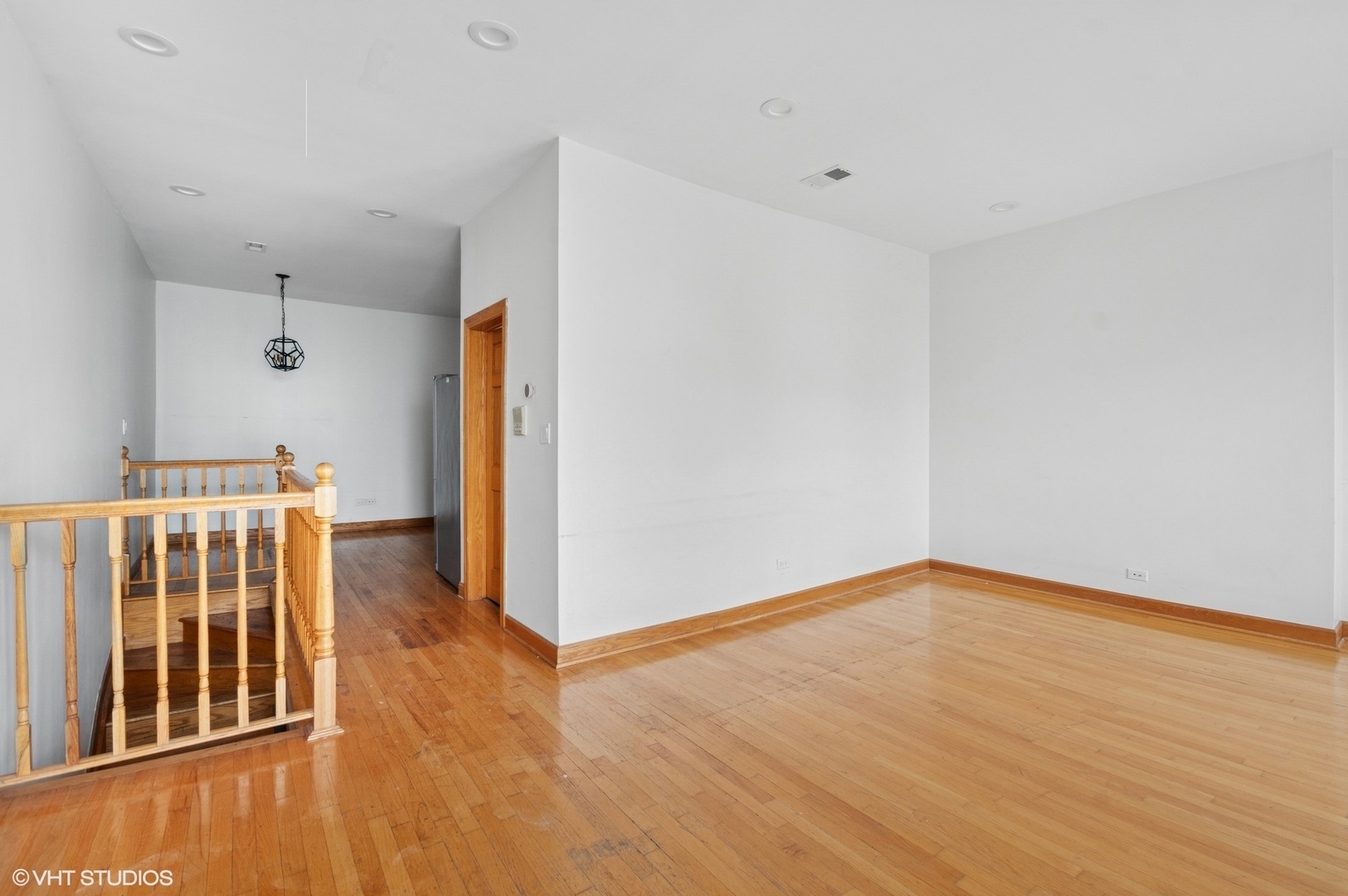 2336 West Taylor Street Chicago, IL 60612 - Photo 22 of 29 a view of an empty room with wooden floor