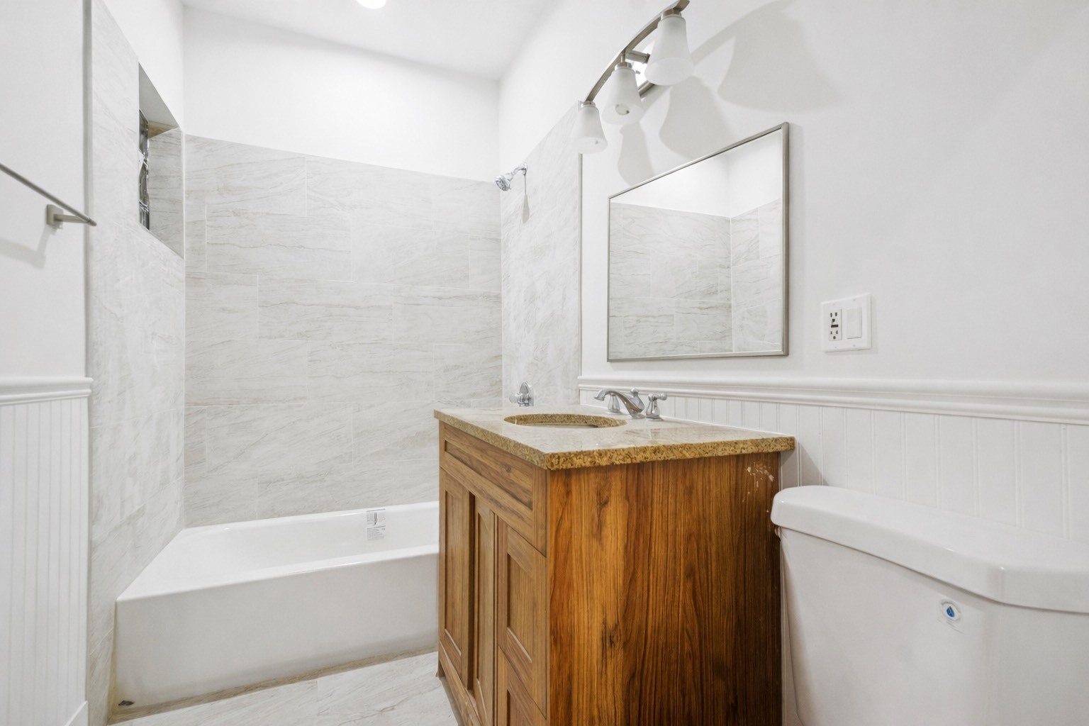 2336 West Taylor Street Chicago, IL 60612 - Photo 10 of 29 a bathroom with a sink and a mirror