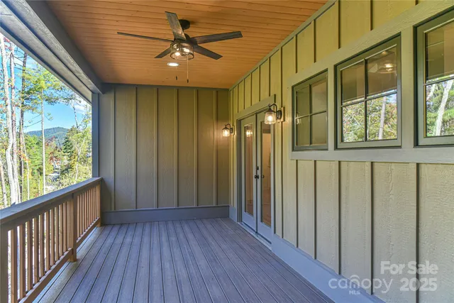 a view of a porch with wooden floor and outdoor space