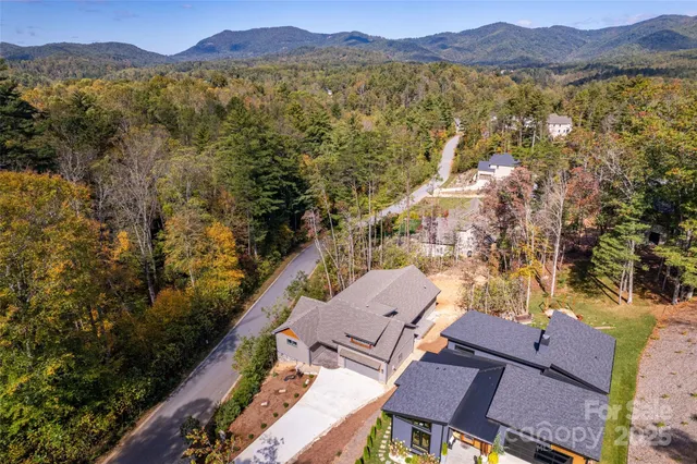 a view of a city with a lake