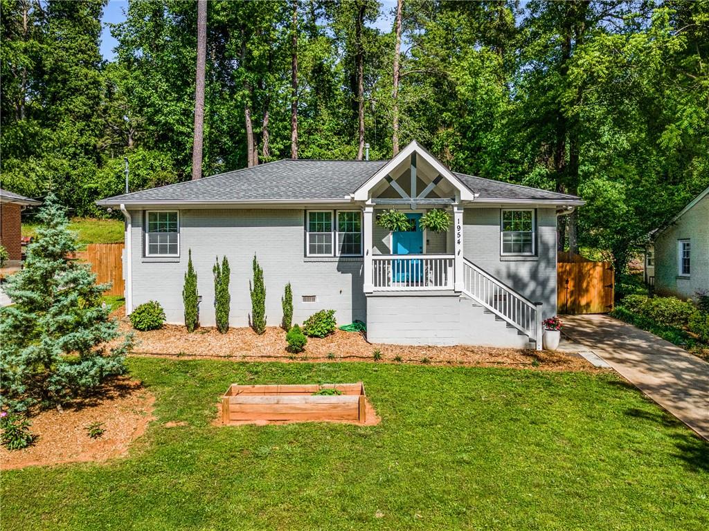1954 Crestmoore Drive Decatur, GA 30032 - Photo 1 of 1 front view of a house with a yard