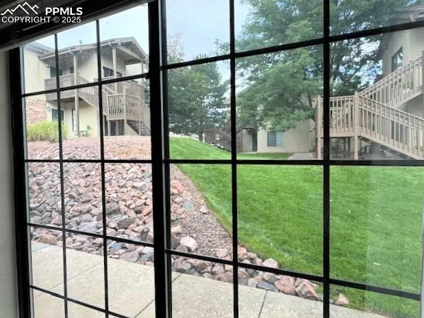 a kitchen with a sink cabinets and window