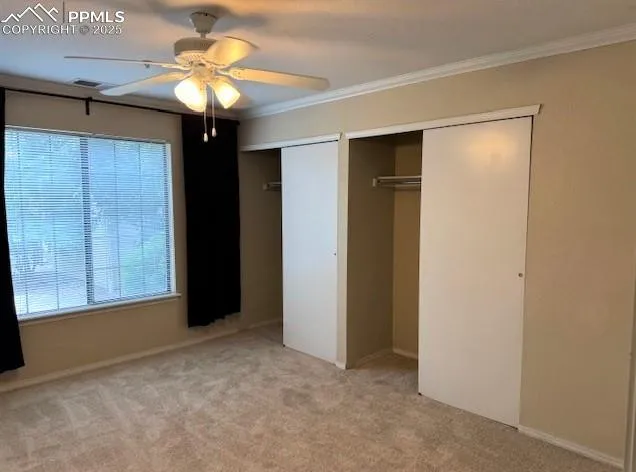 a view of a big room with windows