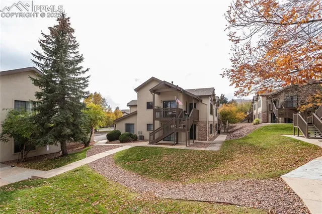 a view of outdoor space and front view of a building
