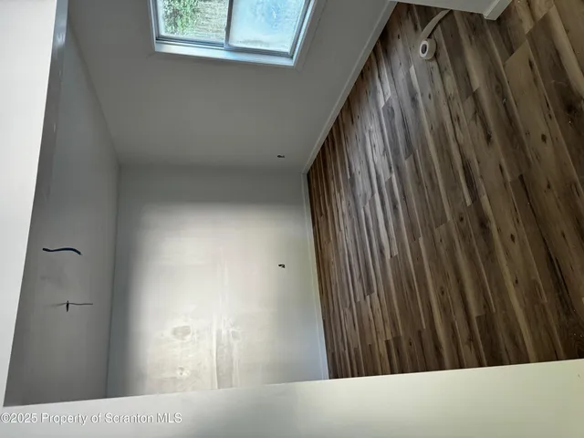 a view of a hallway with entryway