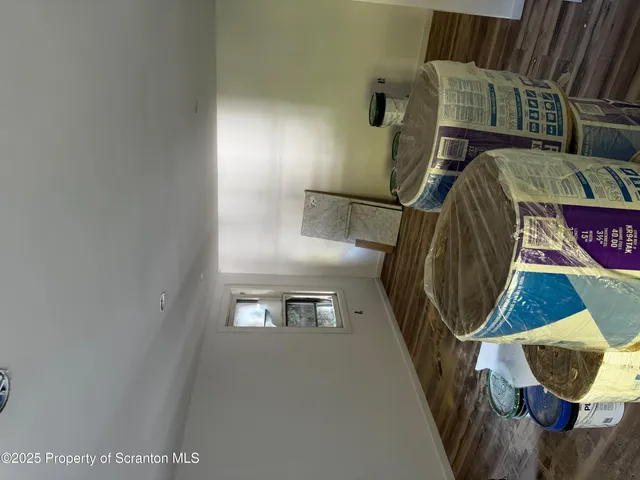 a bathroom with a shower and a mirror