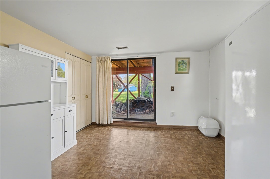 4919 Silver Arrow Drive Riverside, OH 45424 - Photo 37 of 57 This versatile space features practical flooring and direct outdoor access, offering everyday convenience.