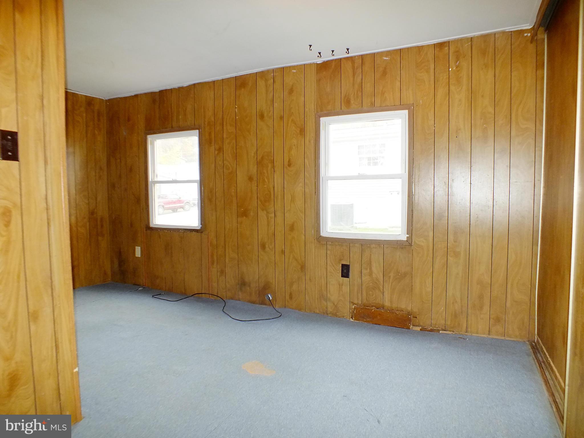 2439 Fairmount Road, Unit 16 Hampstead, MD 21074 - Photo 12 of 17 a view of an empty room with a window