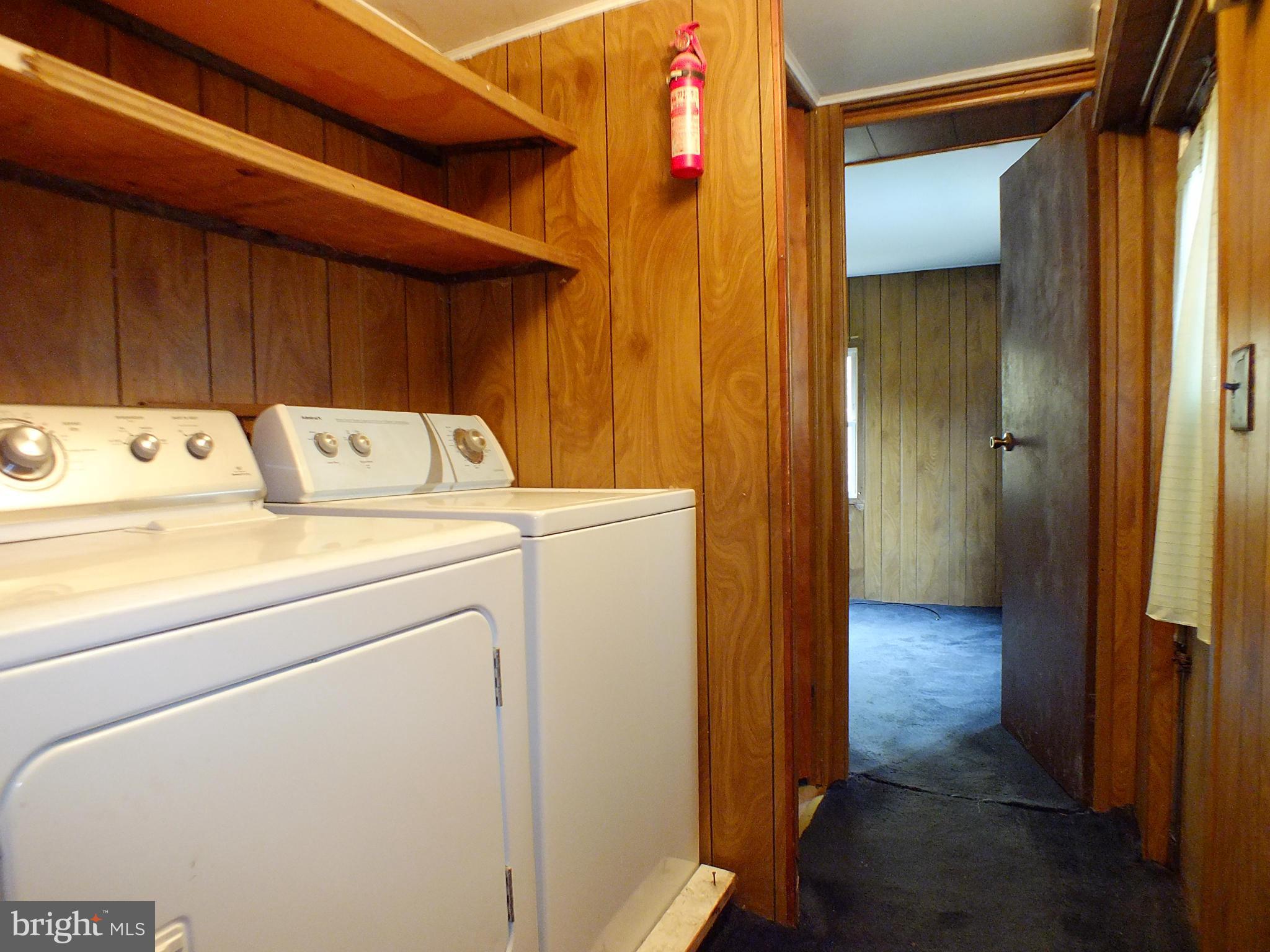 2439 Fairmount Road, Unit 16 Hampstead, MD 21074 - Photo 14 of 17 a utility room with dryer and washer