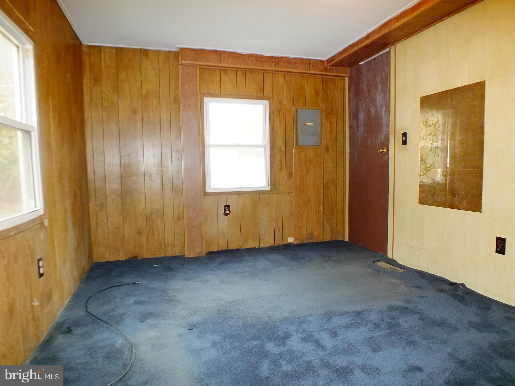 2439 Fairmount Road, Unit 16 Hampstead, MD 21074 - Photo 17 of 17 a view of an empty room with window