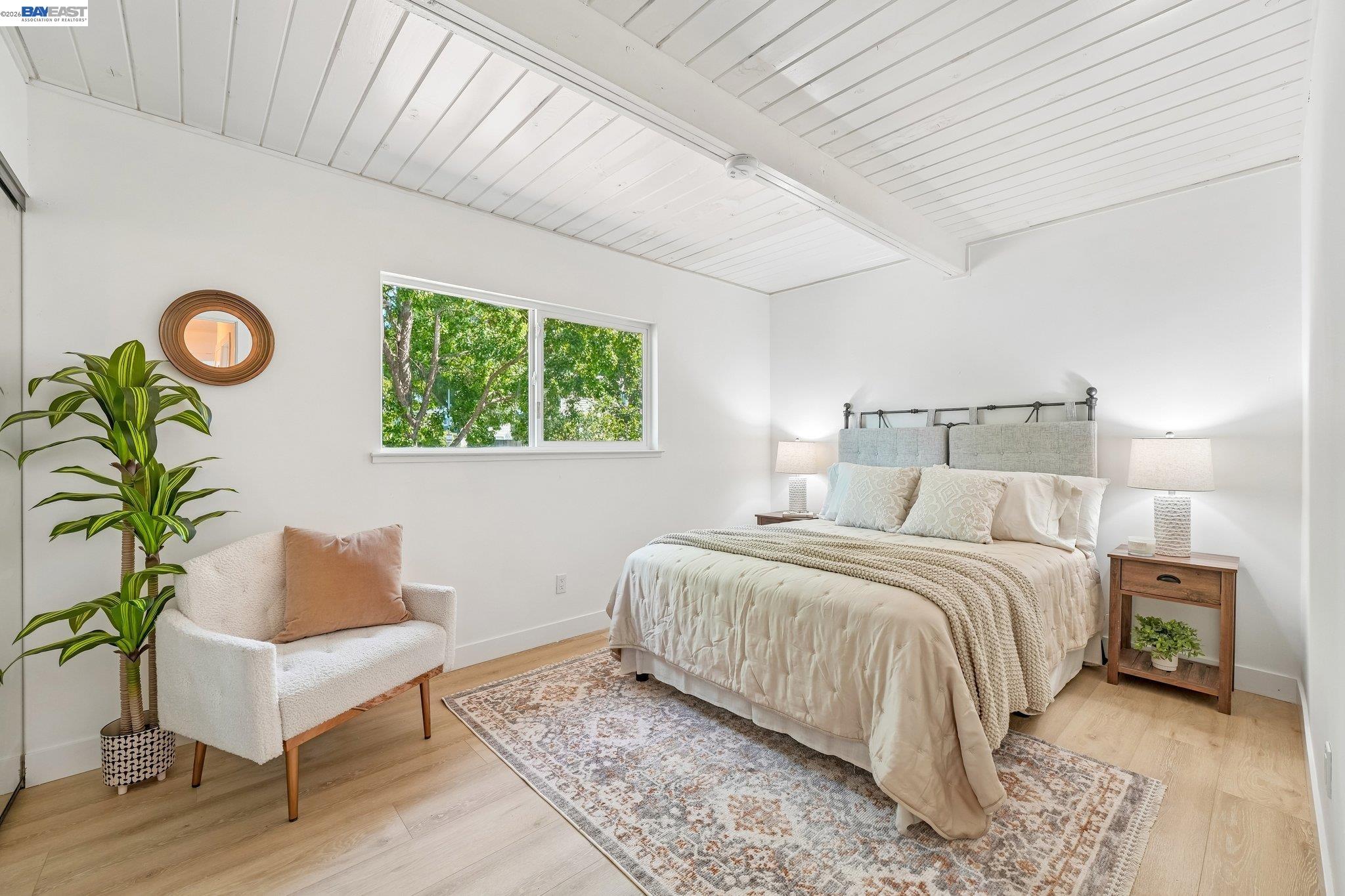 606 West 9th Street Santa Rosa, CA 95401 - Photo 40 of 52 a bedroom with a bed and a couch