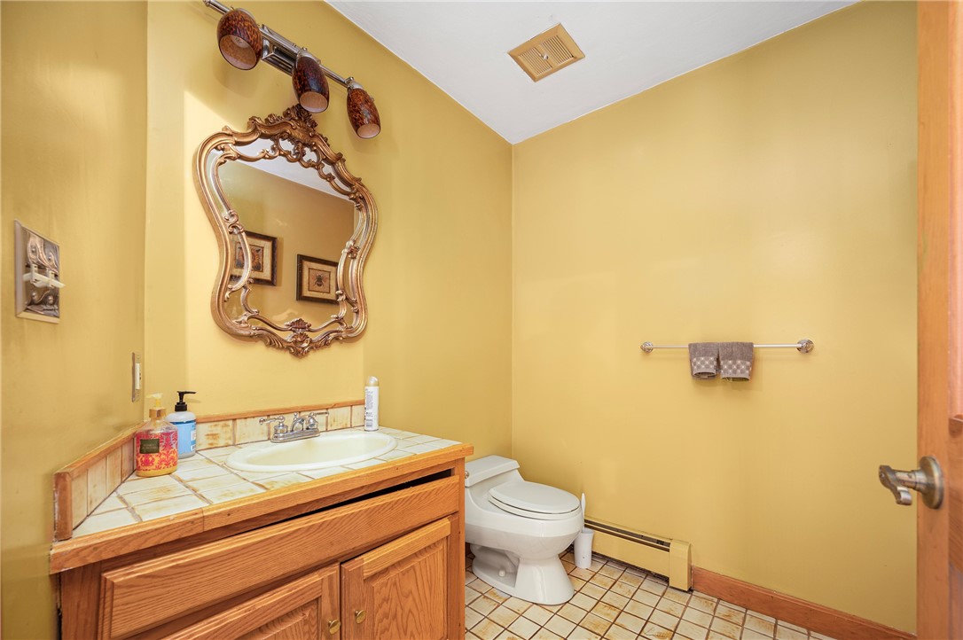 6 Running Stream Road Rehoboth, MA 02769 - Photo 20 of 48 Half bath off entry hall