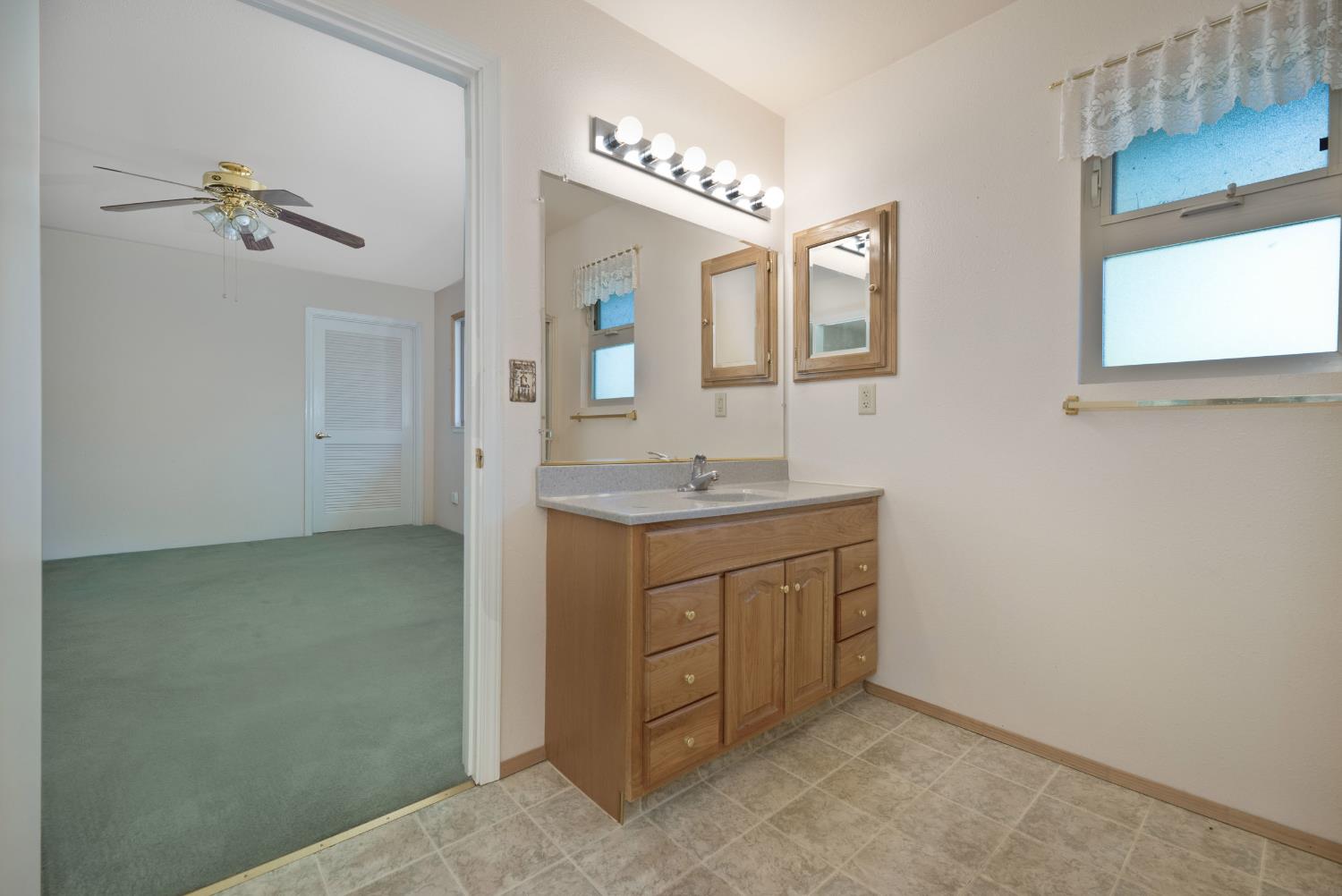 19595 Bow Valley Road Grass Valley, CA 95945 - Photo 51 of 84 ADU Bathroom adjoins Bedroom