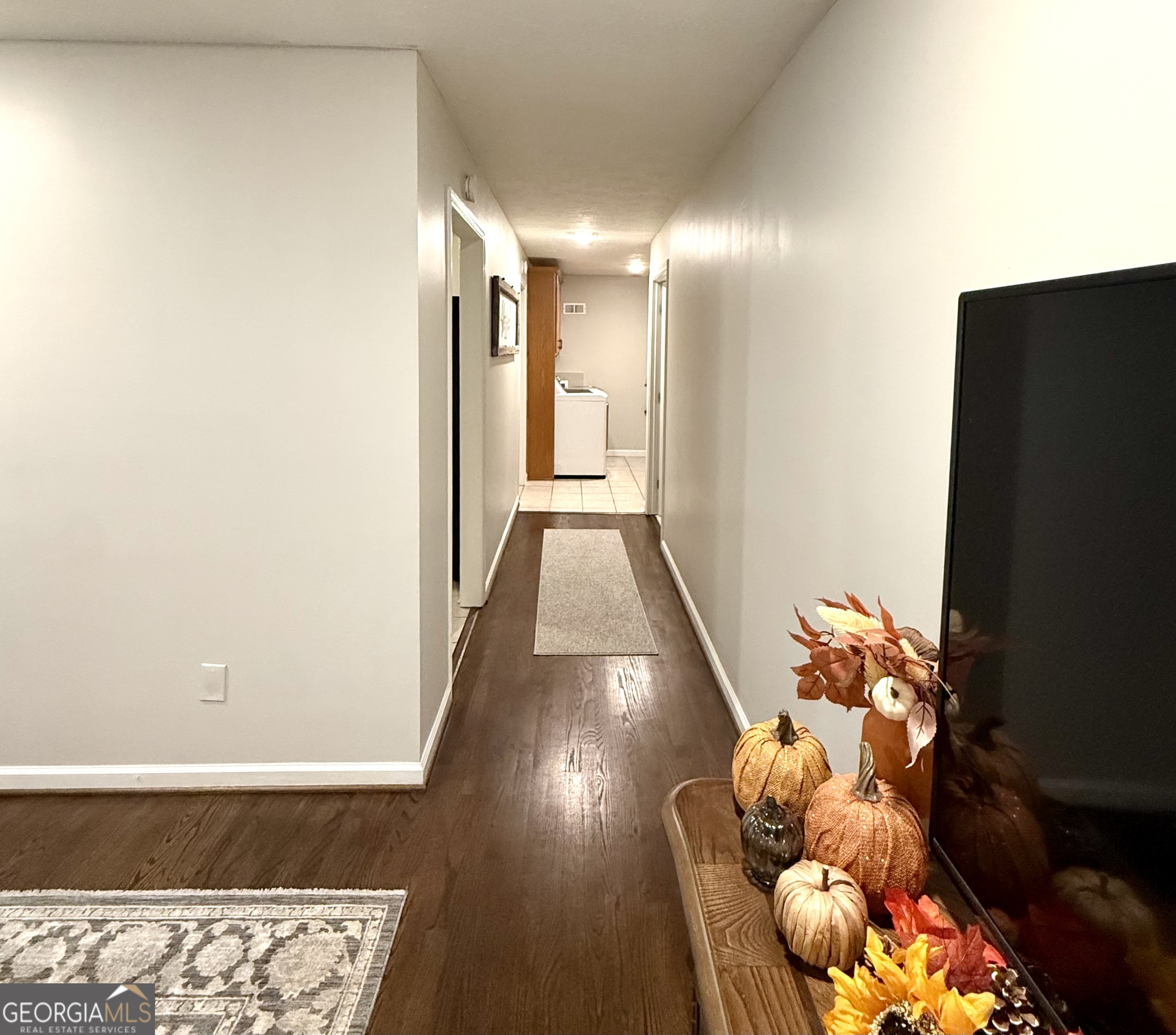 554 Spring Street Commerce, GA 30529 - Photo 20 of 58 a view of entryway with wooden floor