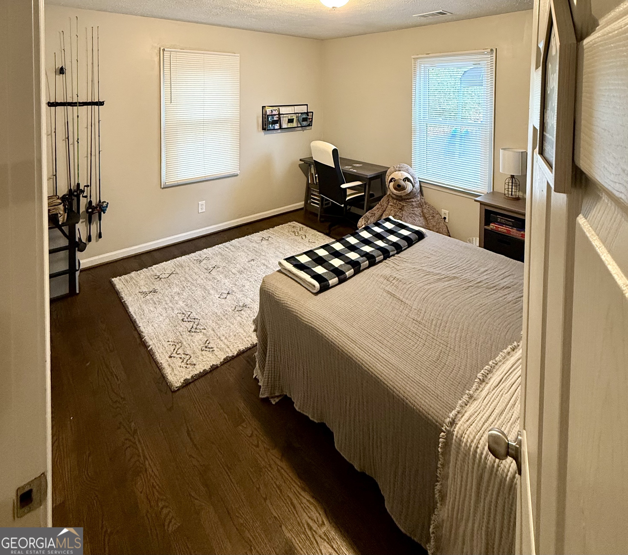 554 Spring Street Commerce, GA 30529 - Photo 45 of 58 a kitchen with a stove and a refrigerator