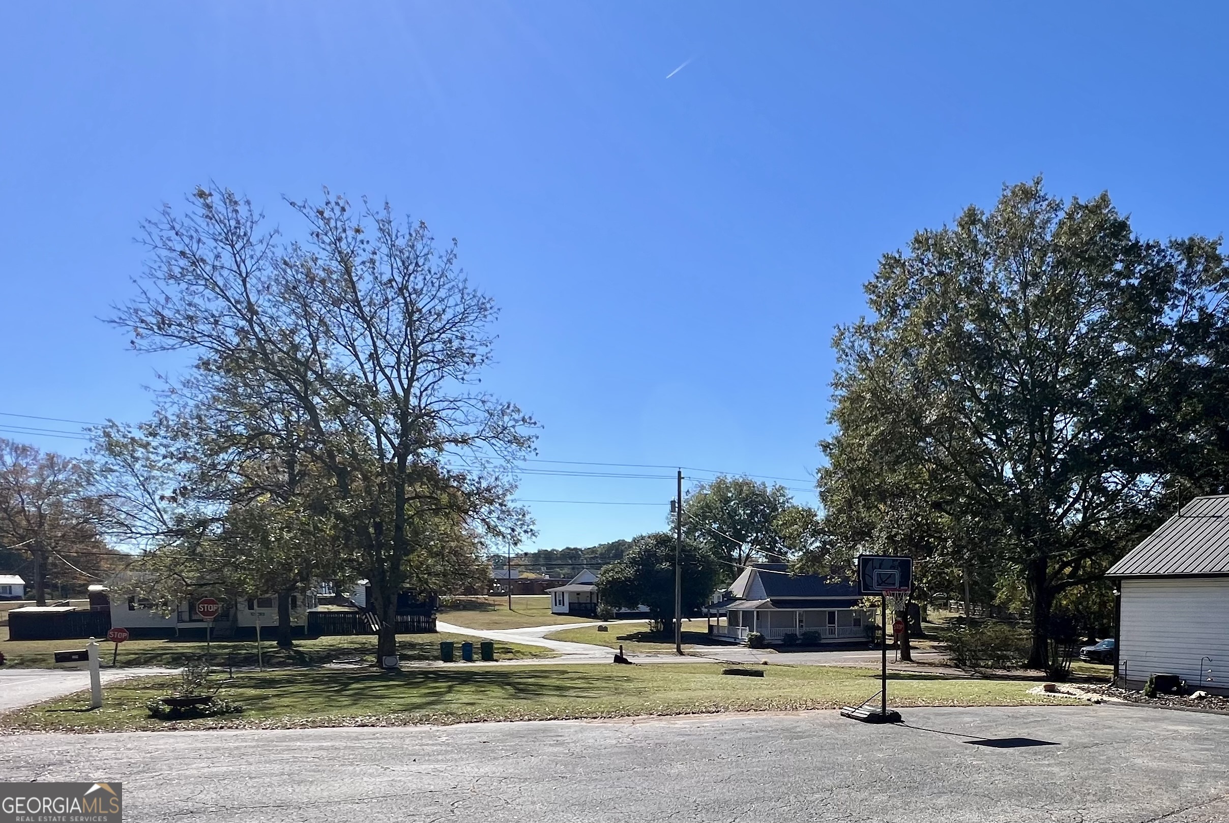 554 Spring Street Commerce, GA 30529 - Photo 57 of 58 a view of a house with a yard