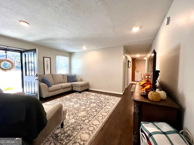 a living room with furniture and a couch