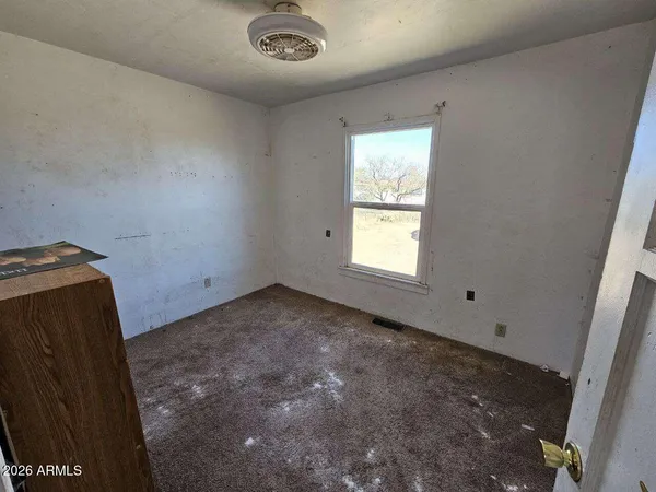 en empty room with windows