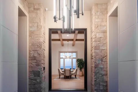 a kitchen with granite countertop a sink and a window