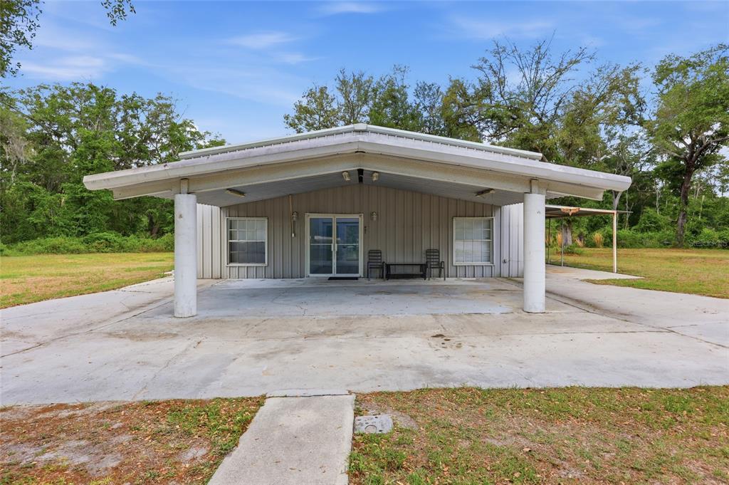401 Southeast Falcon Road Branford, FL 32008 - Photo 62 of 76 a front view of a house with garden