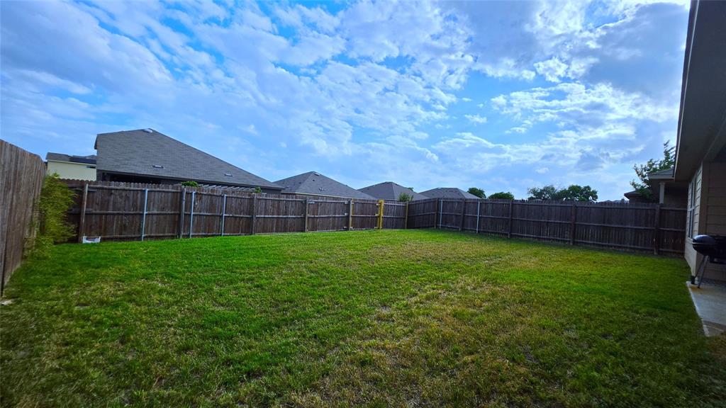 409 Samuel Street Denton, TX 76207 - Photo 40 of 40 a view of a house with a backyard
