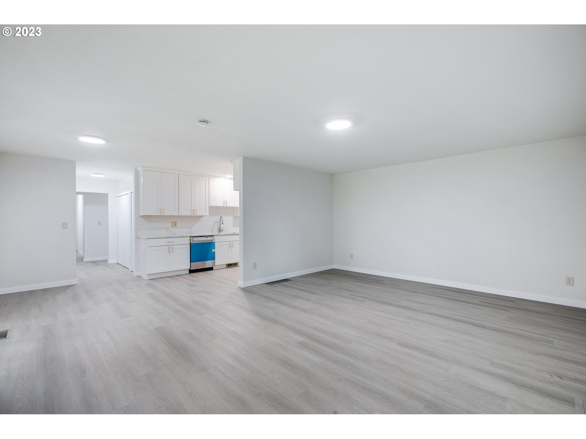 25331 South Larkin Road Beavercreek, OR 97004 - Photo 21 of 44 a view of an empty room with a kitchen
