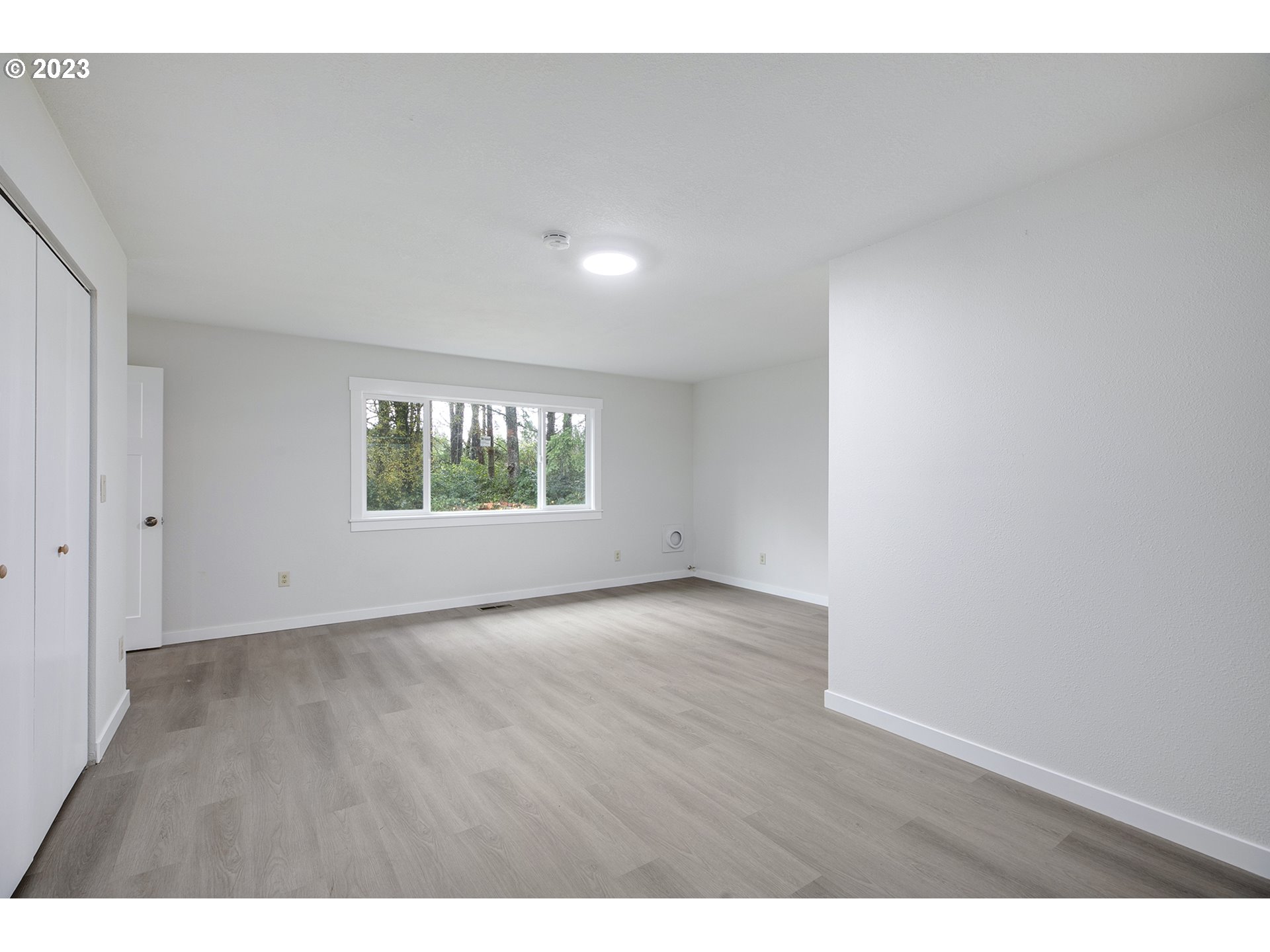 25331 South Larkin Road Beavercreek, OR 97004 - Photo 29 of 44 a view of an empty room with a window