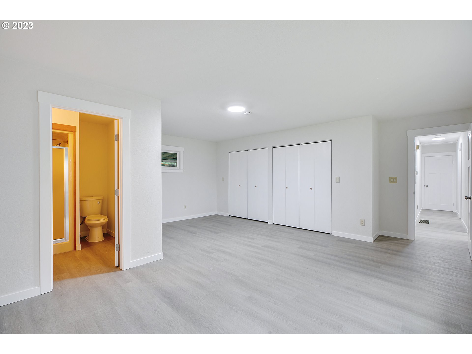 25331 South Larkin Road Beavercreek, OR 97004 - Photo 31 of 44 a view of an empty room with wooden floor