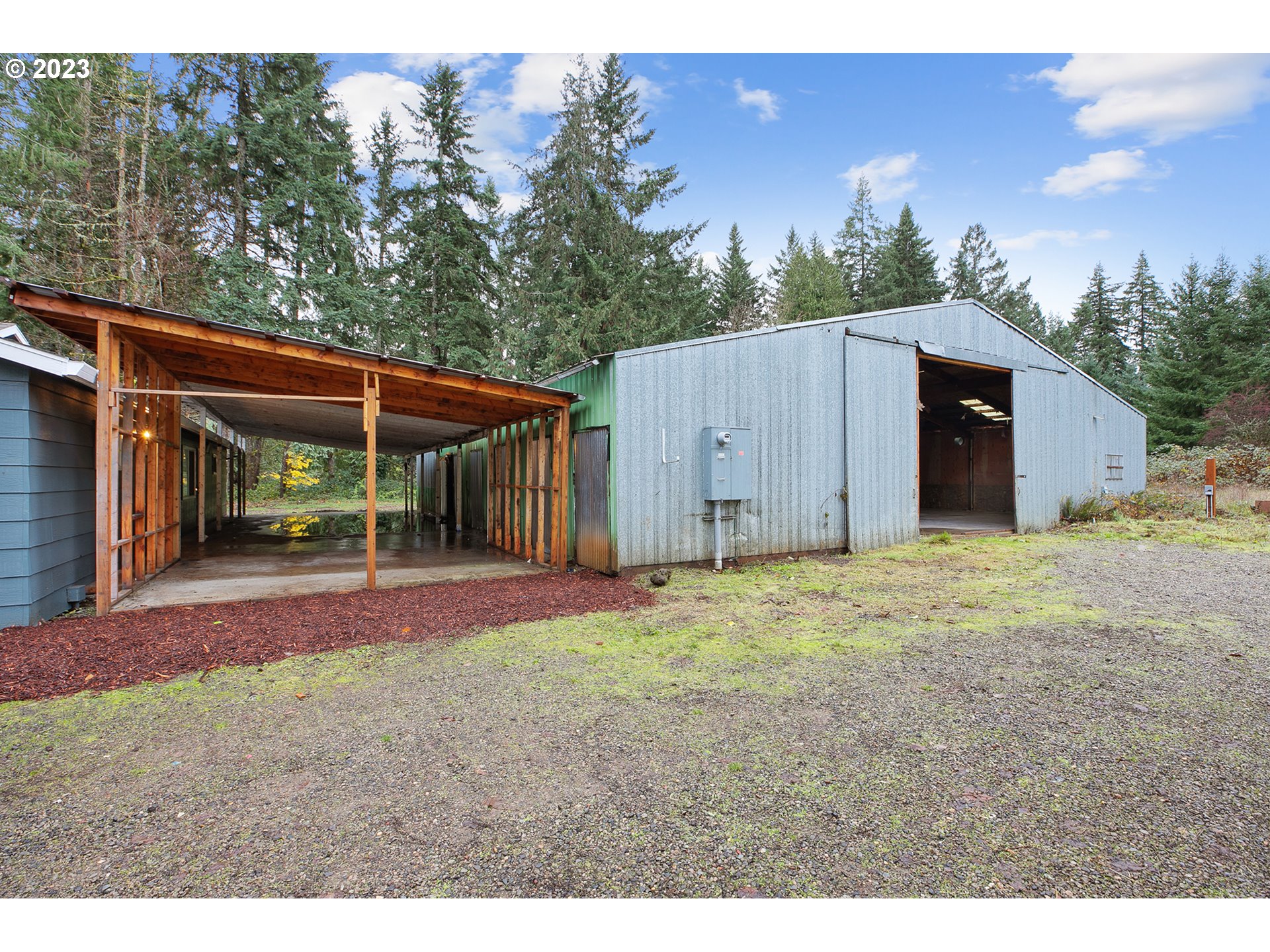 25331 South Larkin Road Beavercreek, OR 97004 - Photo 34 of 44 a house with trees in the background