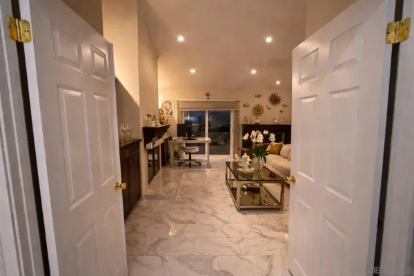 a living room with furniture and a view of living room