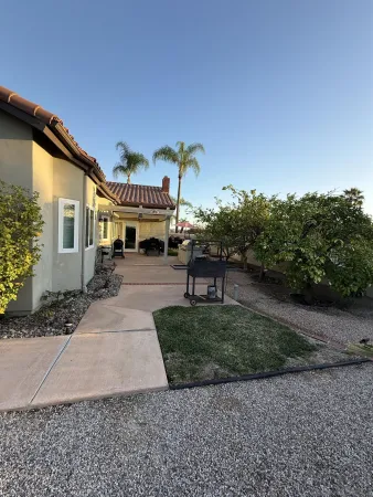a house view with a garden space