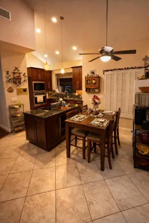 a view of a dining room kitchen and furniture