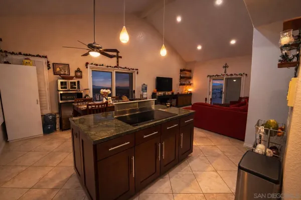 a kitchen with counter top space appliances and cabinets
