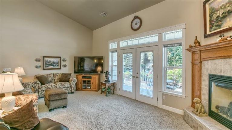 182 Jems Riffle Road Grants Pass, OR 97527 - Photo 6 of 35 Huge great room with French door to cove