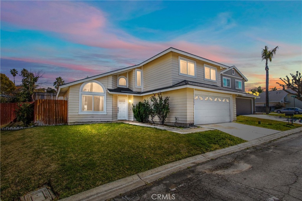7753 Strathmore Road Highland, CA 92346 - Photo 1 of 1 a front view of a house with a yard