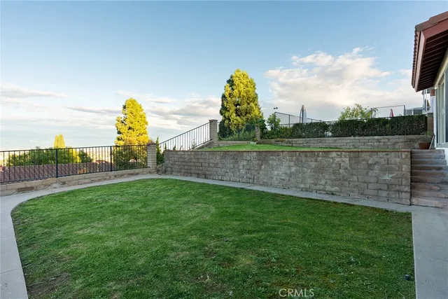 a view of a lake and a yard