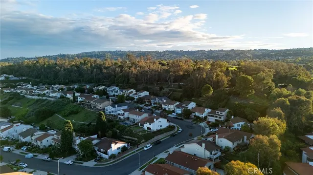 an aerial view of residential building with parking space