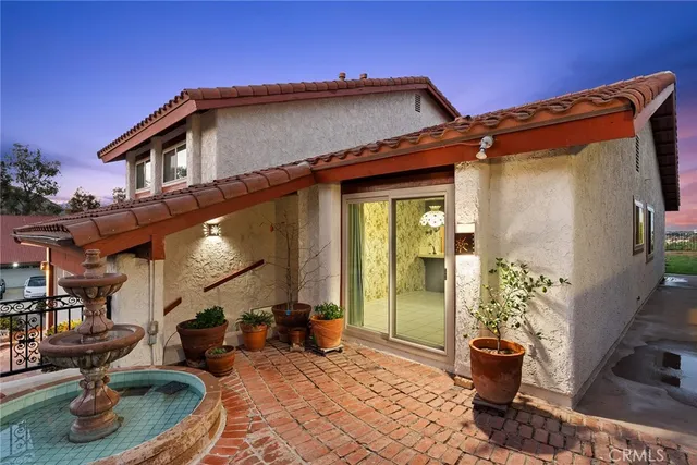 a view of a house with a patio