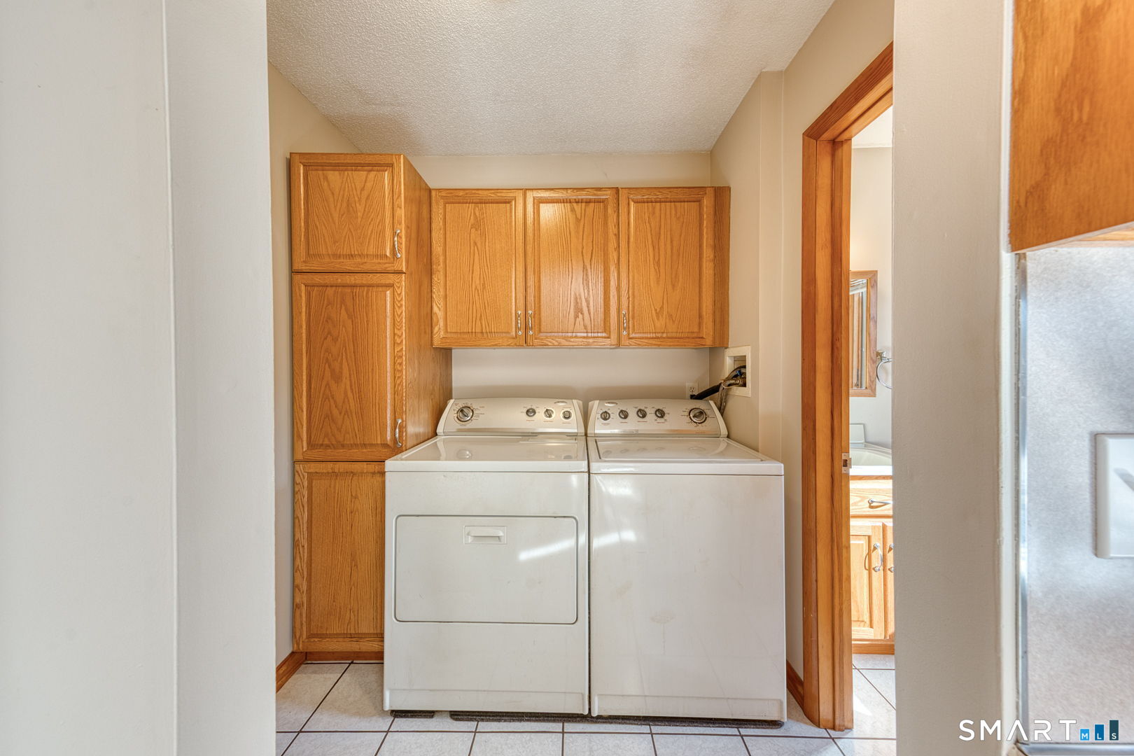 57 4 Rod Road Berlin, CT 06037 - Photo 11 of 31 a utility room with dryer and washer