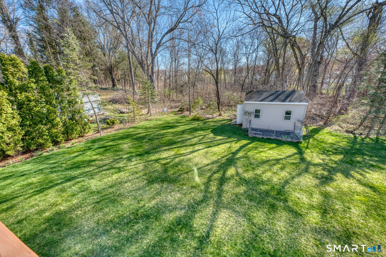 57 4 Rod Road Berlin, CT 06037 - Photo 27 of 31 a green field covered with trees