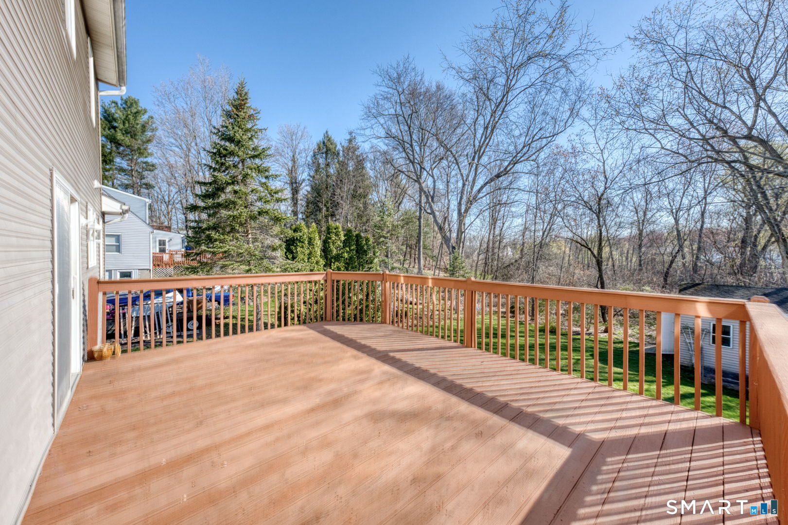 57 4 Rod Road Berlin, CT 06037 - Photo 3 of 31 a view of a balcony with wooden fence