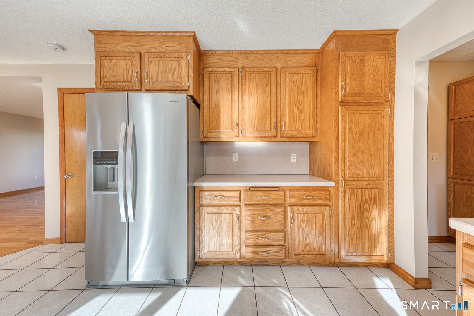 57 4 Rod Road Berlin, CT 06037 - Photo 9 of 31 a kitchen with stainless steel appliances granite countertop a refrigerator and a stove top oven