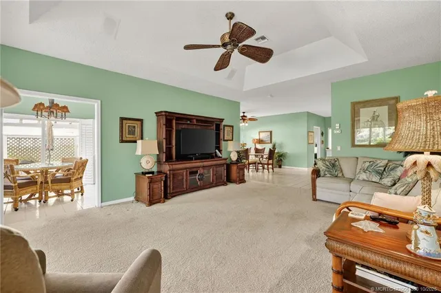 a kitchen with a stove a sink and a refrigerator