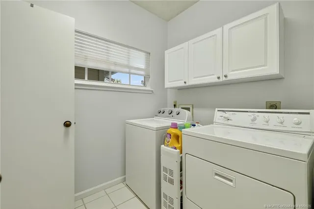 an aerial view of house with yard