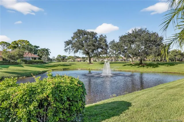 a view of a lake with a big yard
