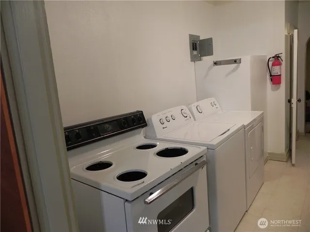a utility room with dryer and washer