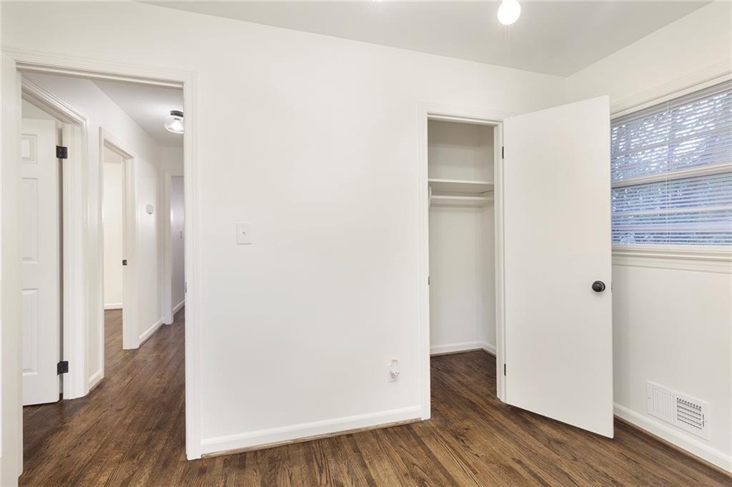4332 Rob Roy Lane Conley, GA 30288 - Photo 15 of 21 a view of hallway with wooden floor